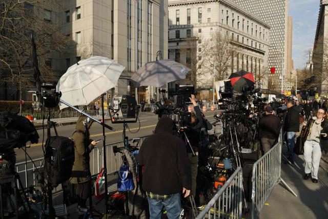 Members of the media gather outside the Daniel Patrick Moynihan United States Courthouse in New York City on March 26, 2026. Lawyers for the ousted Venezuelan president Nicolas Maduro are expected to push for the dismissal of his drug trafficking charges when he appears in a New York court March 26. The Manhattan hearing comes as Washington cautiously warms ties with Caracas, with the question of who will pay the legal fees of the former autocrat and his wife expected to take center stage. (Photo by John Lamparski / AFP)