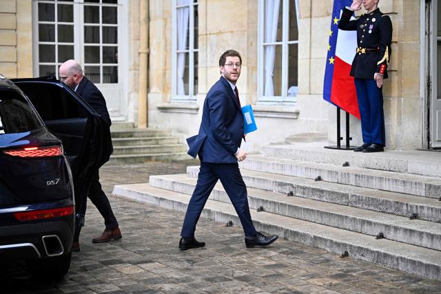 France’s junior Minister for Public Accounts David Amiel arrives to attend a meeting on wartime economy at the French Prime minister official residence Hotel Matignon in Paris on March 26, 2026. (Photo by JULIEN DE ROSA / AFP)