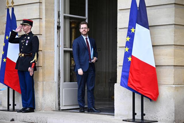France’s junior Minister for Public Accounts David Amiel arrives to attend a meeting on wartime economy at the French Prime minister official residence Hotel Matignon in Paris on March 26, 2026. (Photo by JULIEN DE ROSA / AFP)