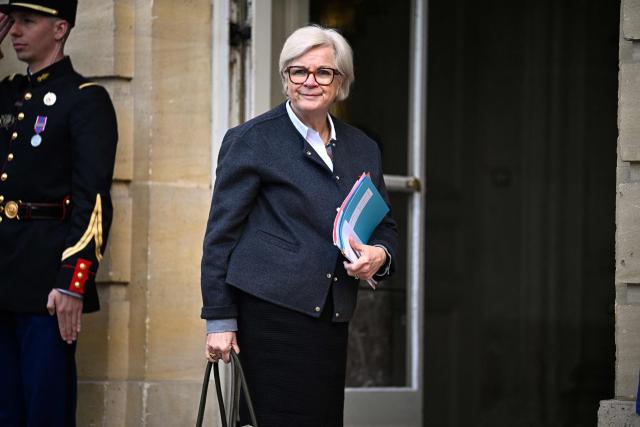 France's Defence Minister Catherine Vautrin arrives to attend a meeting on wartime economy at the French Prime minister official residence Hotel Matignon in Paris on March 26, 2026. (Photo by JULIEN DE ROSA / AFP)