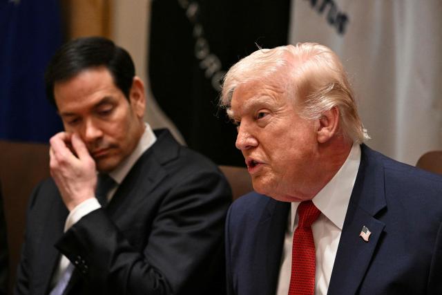 US Secretary of State Marco Rubio listens to President Donald Trump speak during a cabinet meeting in the Cabinet Room of the White House in Washington, DC, on March 26, 2026. (Photo by Jim WATSON / AFP)