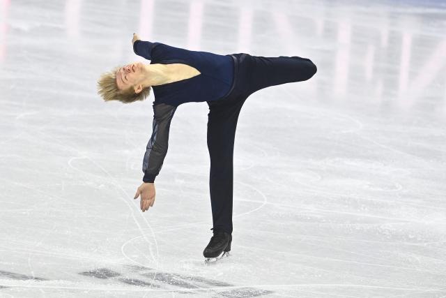 Daniel Grassl from Italy performs during the men's short program at the 2026 ISU World Figure Skating Championships in Prague on March 26, 2026. (Photo by Michal Cizek / AFP)