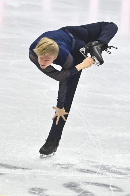 Daniel Grassl from Italy performs during the men's short program at the 2026 ISU World Figure Skating Championships in Prague on March 26, 2026. (Photo by Michal Cizek / AFP)
