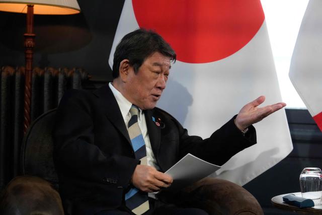Japan's Foreign Affairs Minister Toshimitsu Motegi gestures during a bilateral meeting with France's Foreign Affairs minister on the sidelines of the G7 Foreign Ministers' meeting with Partner Countries at the Vaux-de-Cernay Abbey in Cernay-la-Ville outside Paris, on March 26, 2026. Foreign ministers from the G7 will take part part in a two-day meeting with European nations and allies seeking to narrow differences with the US on the Middle East war while keeping other crises like Ukraine and Gaza high on the agenda. (Photo by Michel Euler / POOL / AFP)