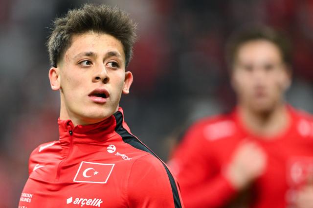 Turkey's midfielder #08 Arda Guler warms up the play-off FIFA World Cup 2026 European qualification knockout semi-final football match between Turkey and Romania at Besiktas Park stadium, in Istanbul on March 26, 2026. (Photo by YASIN AKGUL / AFP)