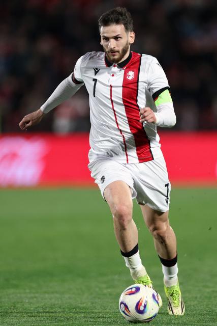 Georgia's forward #07 Khvicha Kvaratskhelia controls the ball during the friendly football match between Georgia and Israel in Tbilisi on March 26, 2026. (Photo by Giorgi ARJEVANIDZE / AFP)