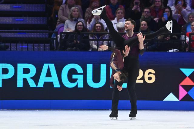 Germany’s Annika Hocke and Robert Kunkel perform during the pairs free skating program of the 2026 ISU Figure Skating World Championships in Prague on March 26, 2026. (Photo by Michal Cizek / AFP)