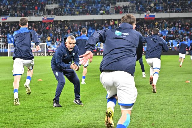 Kosovo's players warm up ahead the play-off 2026 FIFA World Cup European qualification semi-final football match between Slovakia and Kosovo in Bratislava on March 26, 2026. (Photo by Joe Klamar / AFP)