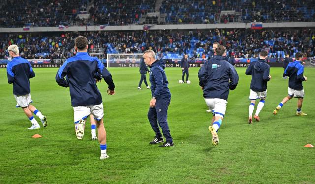 Kosovo's players warm up ahead the play-off 2026 FIFA World Cup European qualification semi-final football match between Slovakia and Kosovo in Bratislava on March 26, 2026. (Photo by Joe Klamar / AFP)