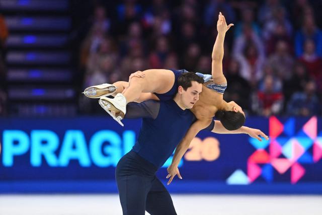 Britain’s Anastasia Vaipan-Law and Luke Digby perform during the pairs free skating program of the 2026 ISU Figure Skating World Championships in Prague on March 26, 2026. (Photo by Michal Cizek / AFP)