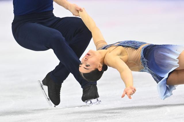 Britain’s Anastasia Vaipan-Law and Luke Digby perform during the pairs free skating program of the 2026 ISU Figure Skating World Championships in Prague on March 26, 2026. (Photo by Michal Cizek / AFP)