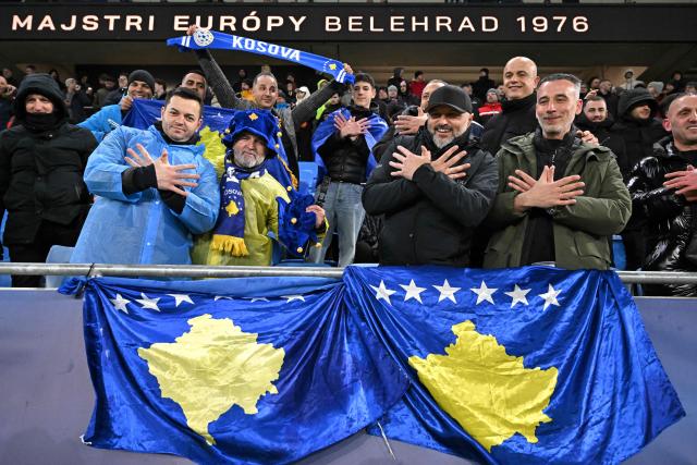 Kosovo's fans cheer ahead the play-off 2026 FIFA World Cup European qualification semi-final football match between Slovakia and Kosovo in Bratislava on March 26, 2026. (Photo by Joe Klamar / AFP)