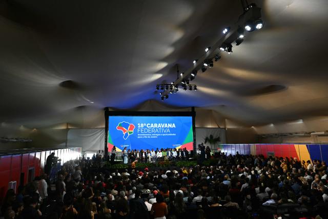 General view of an event to announce investments as part of the Caravana Federativa program in Niteroi, Brazil, on March 26, 2026. (Photo by Mauro PIMENTEL / AFP)