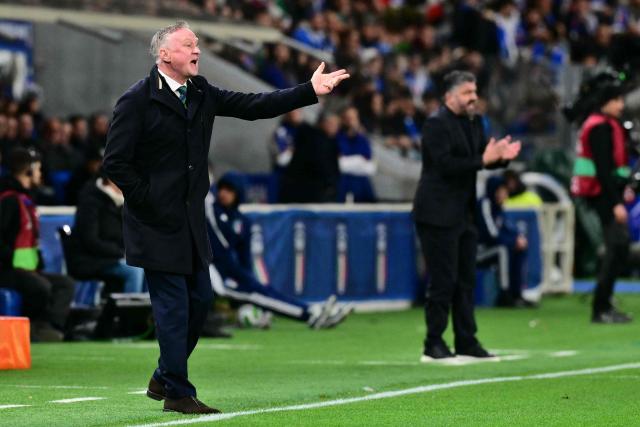 Northern Ireland coach Michael O'Neill and Italy's headcoach Gennaro Gattuso react during the play-off FIFA World Cup 2026 European qualification semi-final football match between Italy and North Ireland at the Gewiss stadium in Bergamo, on March 26, 2026. (Photo by Stefano RELLANDINI / AFP)