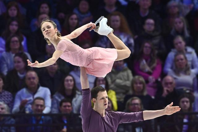 USA's Alisa Efimova and Misha Mitrofanov perform during the pairs free skating program of the 2026 ISU Figure Skating World Championships in Prague on March 26, 2026. (Photo by Michal Cizek / AFP)