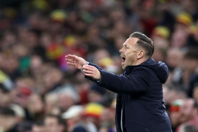 Wales' head coach Craig Bellamy reacts during the FIFA World Cup qualification semi-final football match between Wales and Bosnia and Herzegovina, at Cardiff City Stadium, in Cardiff, on March 26, 2026. (Photo by Darren Staples / AFP)