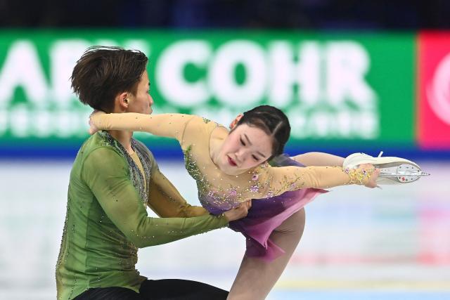 Japan’s Yuna Nagaoka and Sumitada Moriguchi perform during the pairs free skating program of the 2026 ISU Figure Skating World Championships in Prague on March 26, 2026. (Photo by Michal Cizek / AFP)