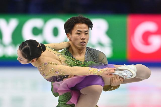 Japan’s Yuna Nagaoka and Sumitada Moriguchi perform during the pairs free skating program of the 2026 ISU Figure Skating World Championships in Prague on March 26, 2026. (Photo by Michal Cizek / AFP)