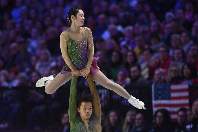 Japan’s Yuna Nagaoka and Sumitada Moriguchi perform during the pairs free skating program of the 2026 ISU Figure Skating World Championships in Prague on March 26, 2026. (Photo by Michal Cizek / AFP)