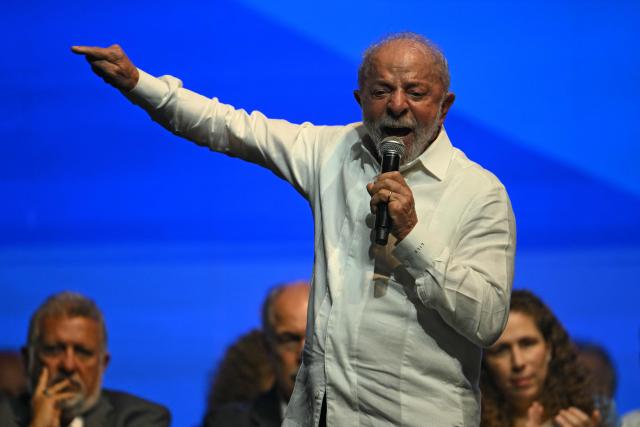Brazil's President Luiz Inacio Lula da Silva gestures as he speaks during an event to announce investments as part of the Caravana Federativa program in Niteroi, Brazil, on March 26, 2026. (Photo by Mauro PIMENTEL / AFP)