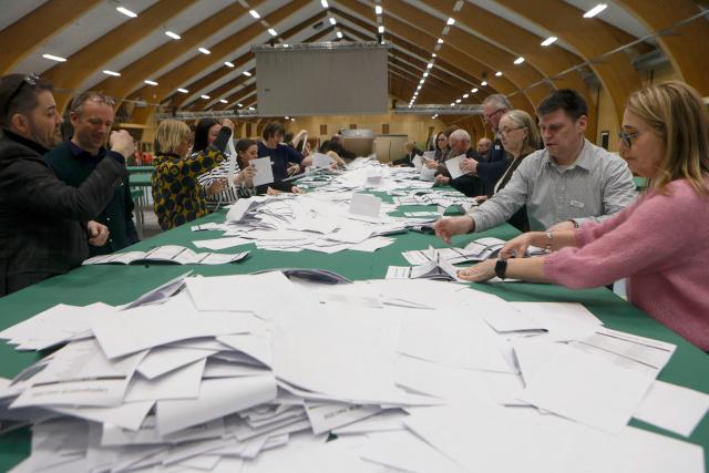 Poll workers count votes after the general election to the Faroese Parliament in Torshavn, Faroe Islands, on March 26, 2026. Voters in the Faroe Islands, an autonomous Danish territory like Greenland, elect their parliament on March 26 after a campaign that largely ignored global tensions in favour of local issues. The government is the self-governing administration of the archipelago, led by the Prime Minister. The government is usually elected every four years by the Faroese Parliament. (Photo by Álvur Haraldsen / Ritzau Scanpix / AFP) / Denmark OUT