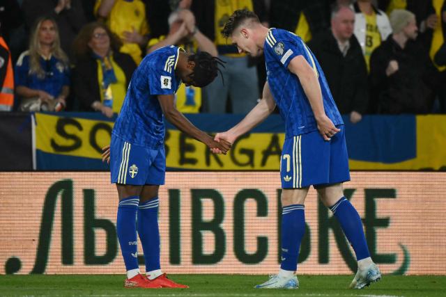 Sweden's forward #17 Viktor Gyokeres celebrates scoring his team's second goal with Sweden's midfielder #11 Anthony Elanga (L) during the 2026 World Cup qualifiers Europe zone semifinal football match between Ukraine and Sweden at Ciutat de Valencia Stadium in Valencia on March 26, 2026. (Photo by JOSE JORDAN / AFP)