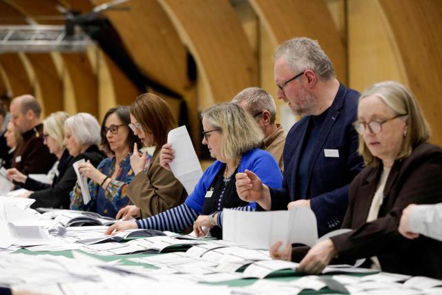 Poll workers count votes after the general election to the Faroese Parliament in Torshavn, Faroe Islands, on March 26, 2026. Voters in the Faroe Islands, an autonomous Danish territory like Greenland, elect their parliament on March 26 after a campaign that largely ignored global tensions in favour of local issues. The government is the self-governing administration of the archipelago, led by the Prime Minister. The government is usually elected every four years by the Faroese Parliament. (Photo by Álvur Haraldsen / Ritzau Scanpix / AFP) / Denmark OUT