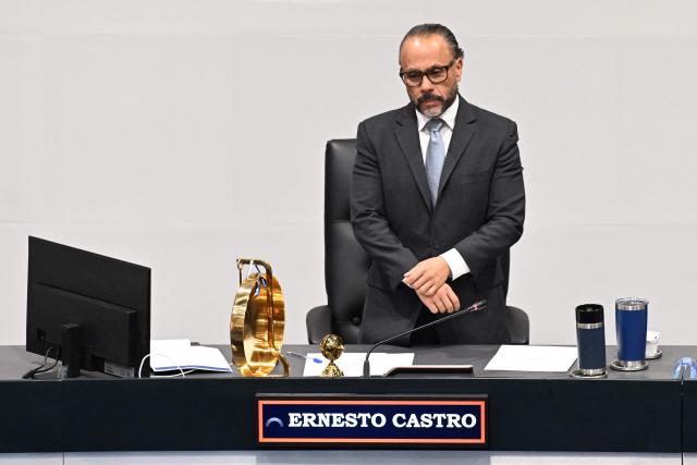 The president of El Salvador’s Congress and member of the ruling party, Ernesto Castro, looks on during the ratification of the constitutional reform to approve life imprisonment and extend the emergency regime to reach four years at the Legislative Assembly in San Salvador on March 26, 2026. (Photo by Marvin RECINOS / AFP)
