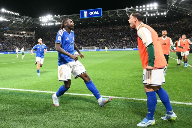 Italy's forward #11 Moise Kean celebrates after scoring his team's second goal during the play-off FIFA World Cup 2026 European qualification semi-final football match between Italy and North Ireland at the Gewiss stadium in Bergamo, on March 26, 2026. (Photo by Alberto PIZZOLI / AFP)