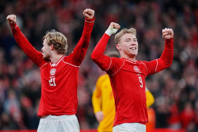 Denmark's midfielder #21 Morten Hjulmand and Denmark's forward #09 Rasmus Hojlund celebrate during the FIFA World Cup 2026 European qualification semi-final football match between Denmark and North Macedonia in Copenhagen on March 26, 2026. (Photo by Liselotte Sabroe / Ritzau Scanpix / AFP) / Denmark OUT