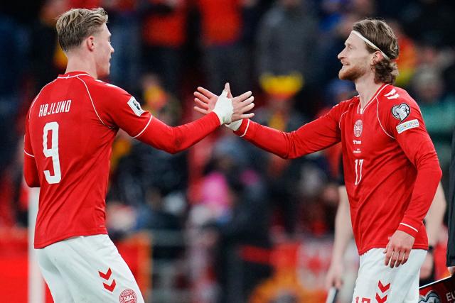 Denmark's forward #09 Rasmus Hojlund is replaced with Denmark's Kasper Hogh during the FIFA World Cup 2026 European qualification semi-final football match between Denmark and North Macedonia in Copenhagen on March 26, 2026. (Photo by Liselotte Sabroe / Ritzau Scanpix / AFP) / Denmark OUT