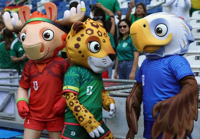 Mascots of the World Cup Maple the Moose (L), Zayu the Jaguar (C) and Clutch the Bald Eagle attend the 2026 FIFA World Cup qualifiers semi-final playoff football match between Bolivia and Suriname at the BBVA Stadium in Guadalupe, Mexico on March 26, 2026. (Photo by Julio Cesar AGUILAR / AFP)