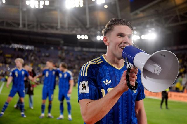 Sweden's forward #17 Viktor Gyokeres speaks through a megaphone as he celebrates with teammates at the end of the 2026 World Cup qualifiers Europe zone semifinal football match between Ukraine and Sweden at Ciutat de Valencia Stadium in Valencia on March 26, 2026. (Photo by Jose JORDAN / AFP)