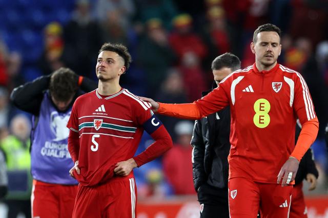 Wales' defender Ethan Ampadu (L) reacts after the FIFA World Cup qualification semi-final football match between Wales and Bosnia and Herzegovina, at Cardiff City Stadium, in Cardiff, on March 26, 2026. (Photo by Darren Staples / AFP)