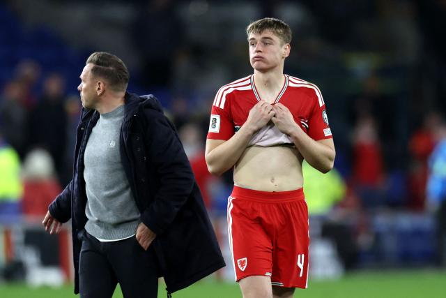 Wales' defender Dylan Lawlor reacts after the FIFA World Cup qualification semi-final football match between Wales and Bosnia and Herzegovina, at Cardiff City Stadium, in Cardiff, on March 26, 2026. (Photo by Darren Staples / AFP)