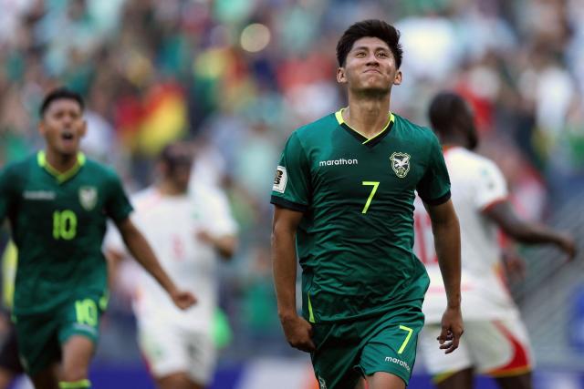 Bolivia's forward #07 Miguel Terceros celebrates after scoring a penalty kick during the 2026 FIFA World Cup qualifiers semi-final playoff football match between Bolivia and Suriname at the BBVA Stadium in Guadalupe, Mexico on March 26, 2026. (Photo by Julio Cesar AGUILAR / AFP)