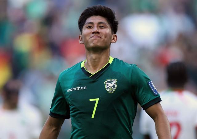 Bolivia's forward #07 Miguel Terceros celebrates after scoring a penalty kick during the 2026 FIFA World Cup qualifiers semi-final playoff football match between Bolivia and Suriname at the BBVA Stadium in Guadalupe, Mexico on March 26, 2026. (Photo by Julio Cesar AGUILAR / AFP)
