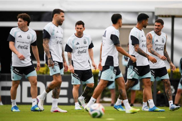 Argentina's forward Lionel Messi (C) looks on during a training session in Ezeiza, Buenos Aires province on March 26, 2026, ahead of a friendly match against Mauritania on March 27 at the La Bombonera Stadium in Buenos Aires. (Photo by Luis ROBAYO / AFP)