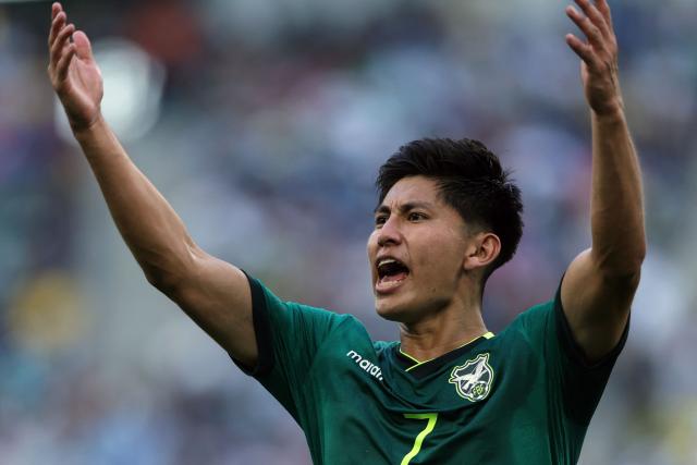 Bolivia's forward #07 Miguel Terceros celebrates after scoring a penalty kick during the 2026 FIFA World Cup qualifiers semi-final playoff football match between Bolivia and Suriname at the BBVA Stadium in Guadalupe, Mexico on March 26, 2026. (Photo by Julio Cesar AGUILAR / AFP)