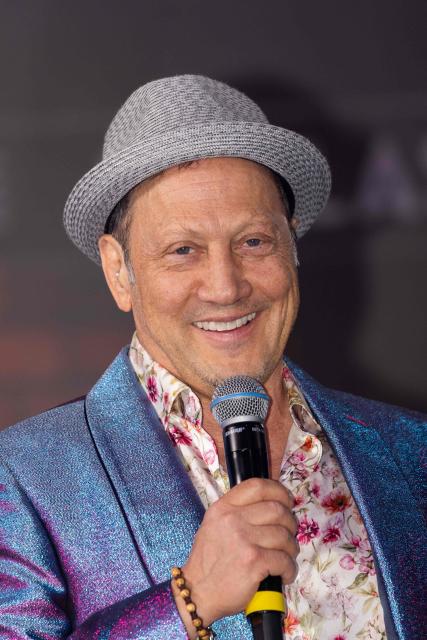 US actor and comedian Rob Schneider delivers a comedy set at the Conservative Political Action Conference (CPAC) in Grapevine, Texas, on March 26, 2026. American conservatives converge on Texas this week for what organizers bill as their largest and most influential gathering, with the Iran war and fears of a punishing midterm election cycle heightening the stakes. (Photo by Leandro Lozada / AFP)