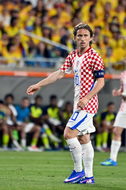 Croatia's midfielder #10 Luka Modric looks on during a friendly football match between Colombia and Croatia at Camping World Stadium in Orlando, Florida, on March 26, 2026. (Photo by Miguel J. Rodriguez CARRILLO / AFP)