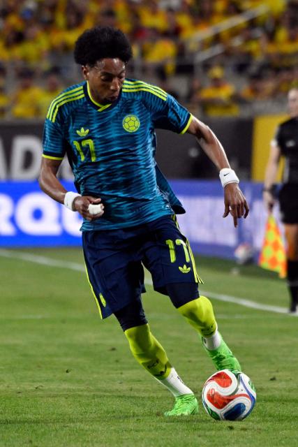 Colombia's defender #17 Johan Mojica controls the ball during a friendly football match between Colombia and Croatia at Camping World Stadium in Orlando, Florida, on March 26, 2026. (Photo by Miguel J. Rodriguez CARRILLO / AFP)
