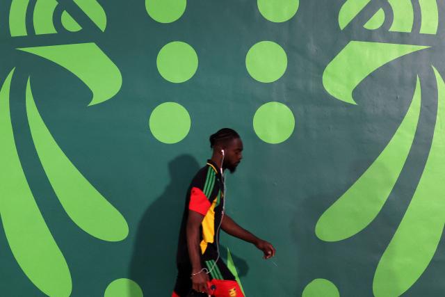A Jamaican player walks on arrival at the Akron Stadium ahead of the 2026 FIFA World Cup qualifiers semi-final playoff football match between New Caledonia and Jamaica in Zapopan, state of Jalisco, Mexico on March 26, 2026. (Photo by Ulises Ruiz / AFP)
