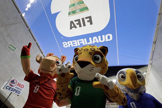 Mascots of the World Cup Maple the Moose (L), Zayu the Jaguar (C) and Clutch the Bald Eagle attend the 2026 FIFA World Cup qualifiers semi-final playoff football match between New Caledonia and Jamaica at the Akron Stadium in Zapopan, state of Jalisco, Mexico on March 26, 2026. (Photo by Ulises Ruiz / AFP)
