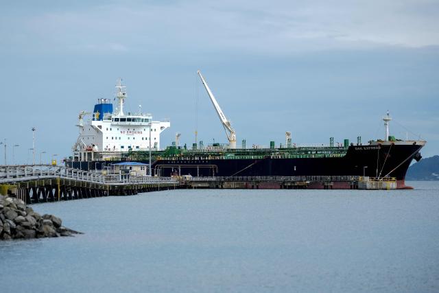 The tanker ship Oak Express unloads oil at the Seaview fuel terminal at Point Howard in Wellington on March 27, 2026. (Photo by Marty MELVILLE / AFP)