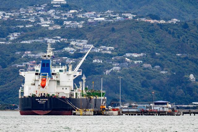 The tanker ship Oak Express unloads oil at the Seaview fuel terminal at Point Howard in Wellington on March 27, 2026. (Photo by Marty MELVILLE / AFP)