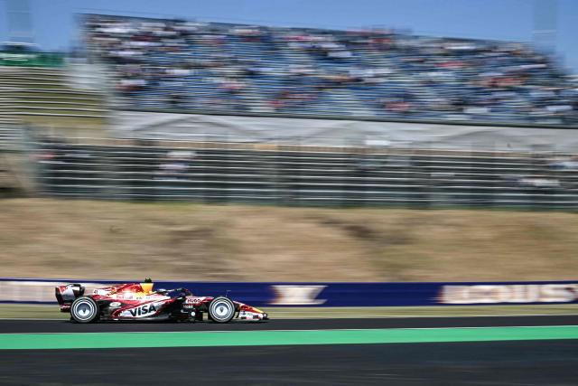 Racing Bulls' British driver Arvid Lindblad drives during the first practice session ahead of the Formula One Japanese Grand Prix at the Suzuka circuit in Suzuka, Mie prefecture on March 27, 2026. (Photo by ANDREW CABALLERO-REYNOLDS / AFP)