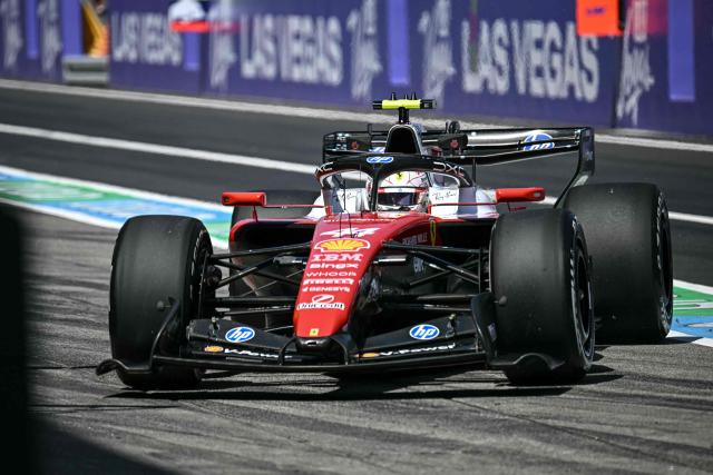Ferrari's British driver Lewis Hamilton arrives to the pit lane during the first practice session ahead of the Formula One Japanese Grand Prix at the Suzuka circuit in Suzuka, Mie prefecture on March 27, 2026. (Photo by Philip FONG / AFP)