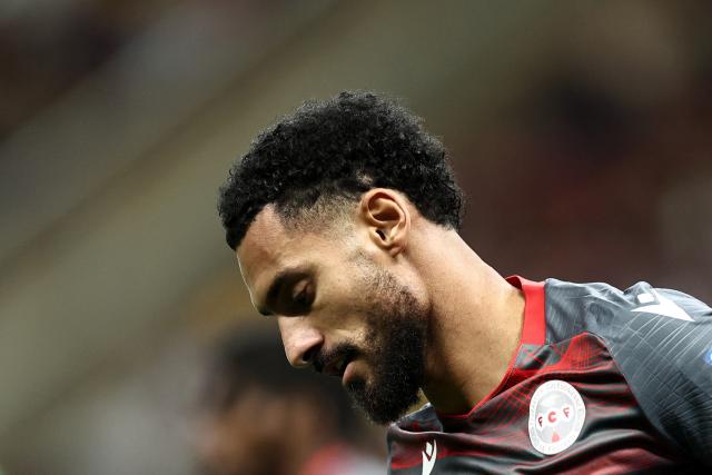 New Caledonia's midfielder #17 Angelo Fulgini reacts during the 2026 FIFA World Cup qualifiers semi-final playoff football match between New Caledonia and Jamaica at the Akron Stadium in Zapopan, Mexico on March 26, 2026. (Photo by Ulises Ruiz / AFP)