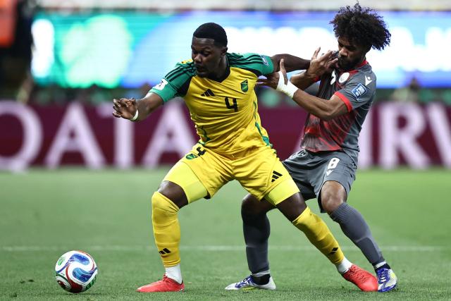 Jamaica's midfielder #04 Ephron Mason-Clark and New Caledonia's midfielder #08 Joris Kenon fight for the ball during the 2026 FIFA World Cup qualifiers semi-final playoff football match between New Caledonia and Jamaica at the Akron Stadium in Zapopan, Mexico on March 26, 2026. (Photo by Ulises Ruiz / AFP)